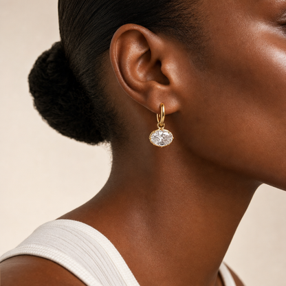East West Diamond Oval Drop earring in gold, worn