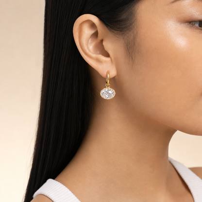 East West Diamond Oval Drop earring in gold, worn