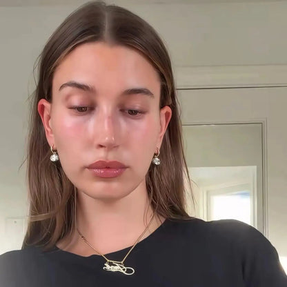 Hailey oval drop earrings worn