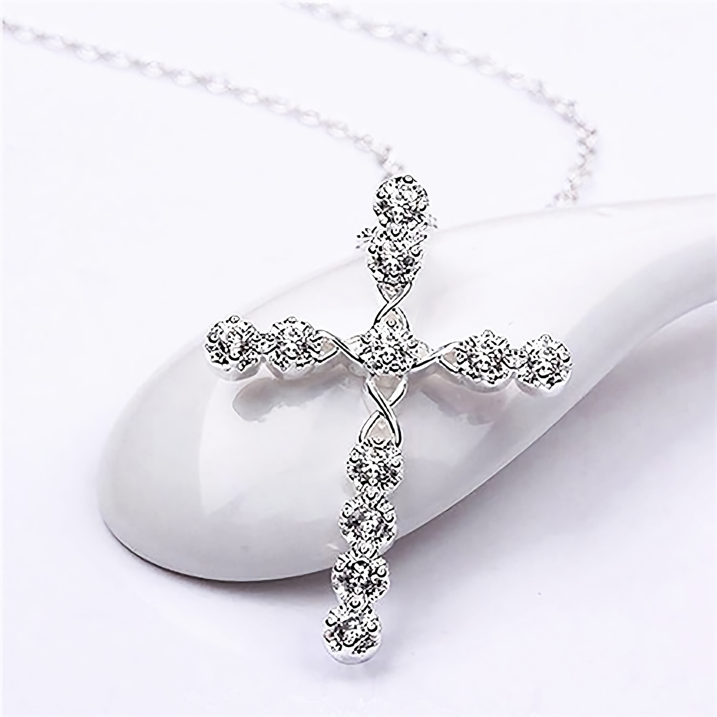 Sterling Silver Diamond Twist Cross Necklace